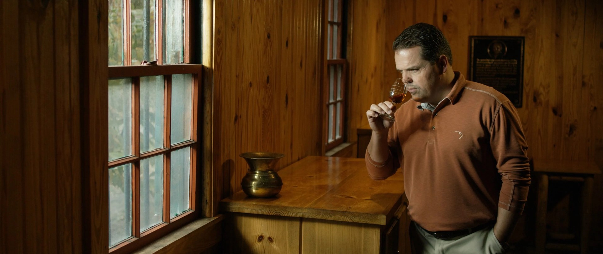 master distiller harlen wheatley smelling a glass of whiskey