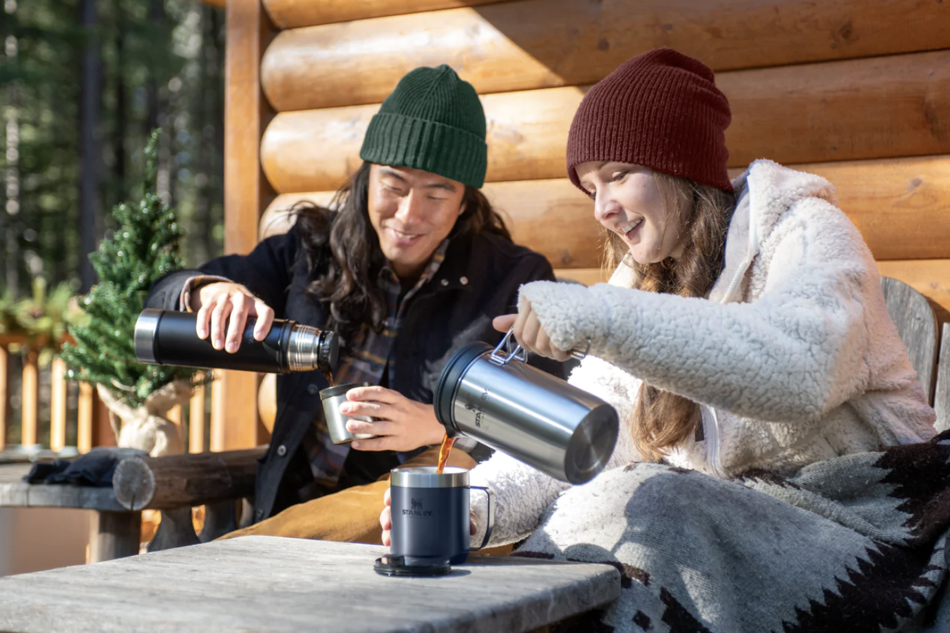 couple using stanley thermos and french press
