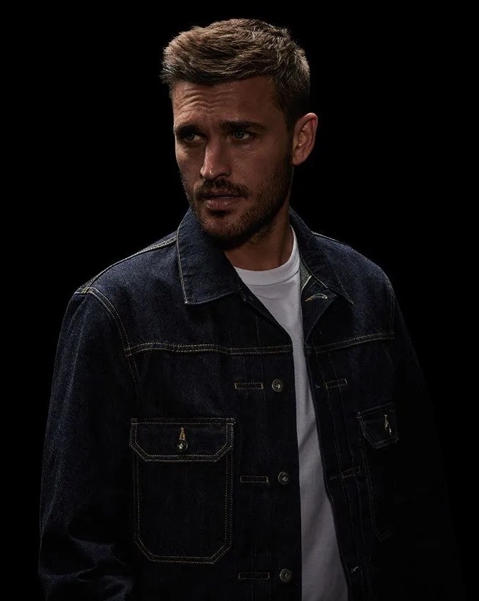 man wearing vollebak japanese selvedge denim jacket