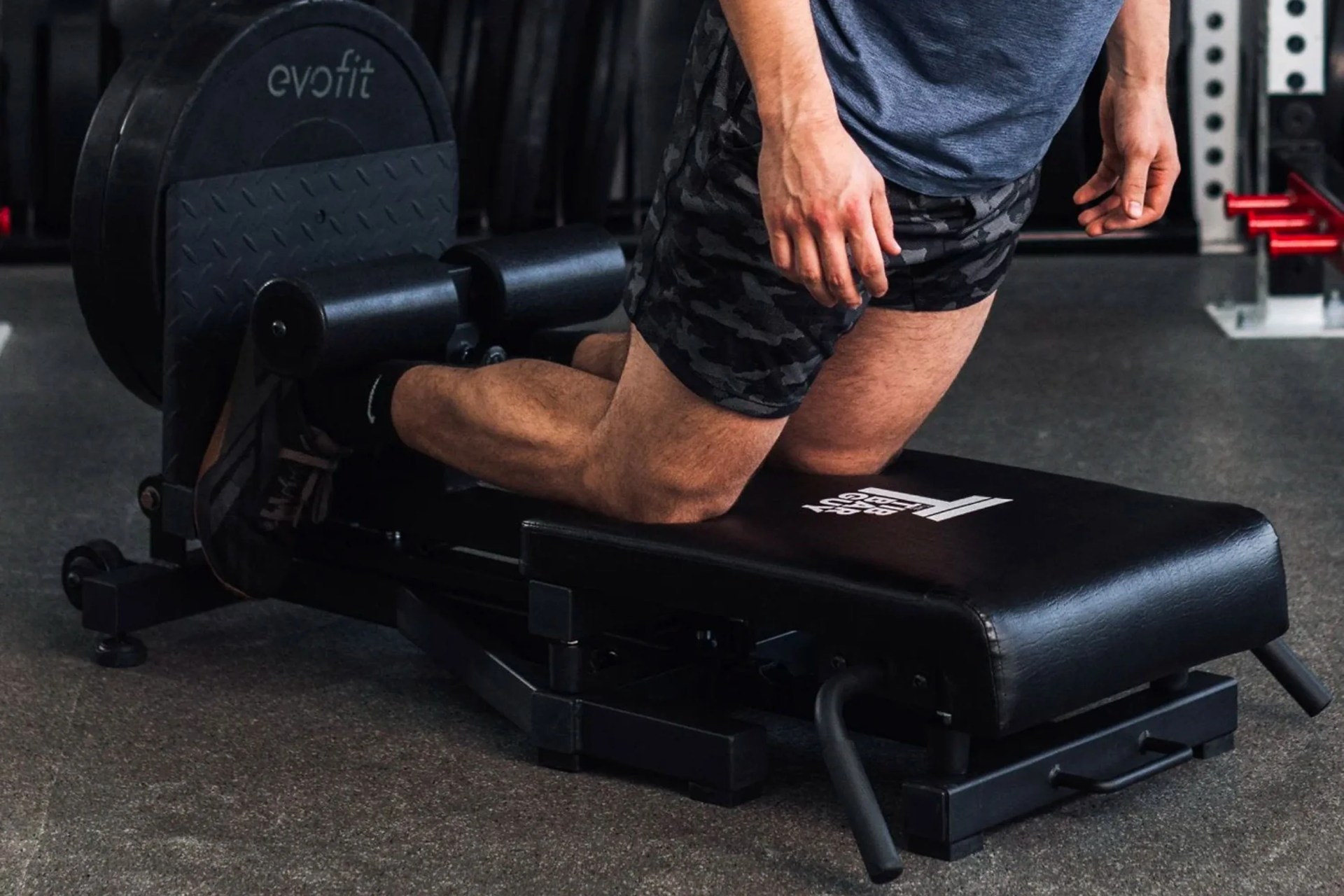 man using the tib bar guy nordic bench