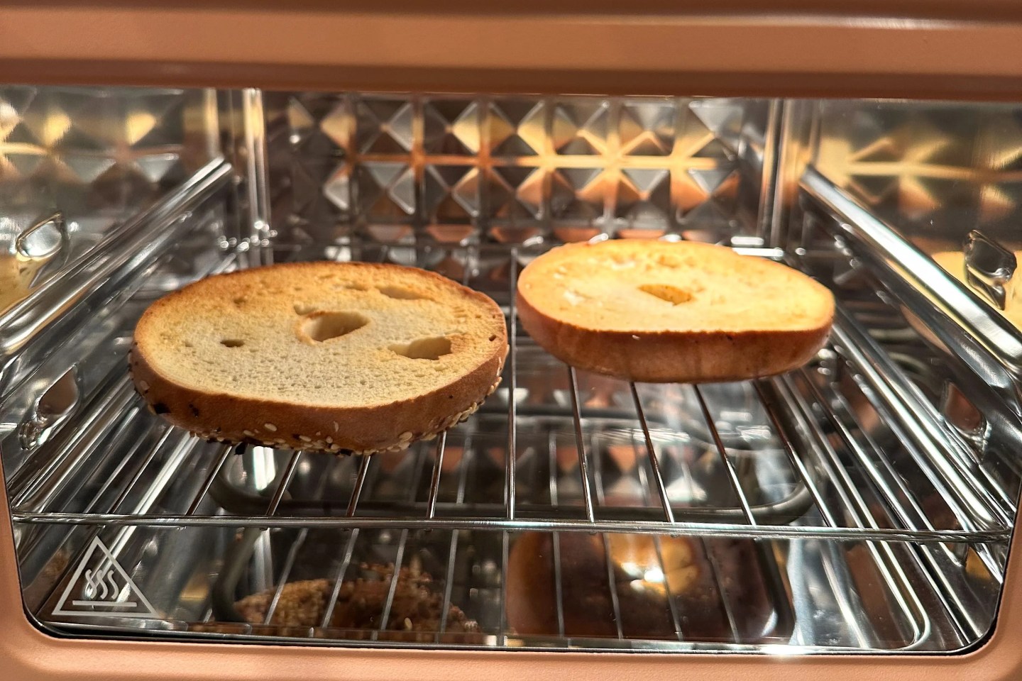 our place wonder oven toasting a bagel