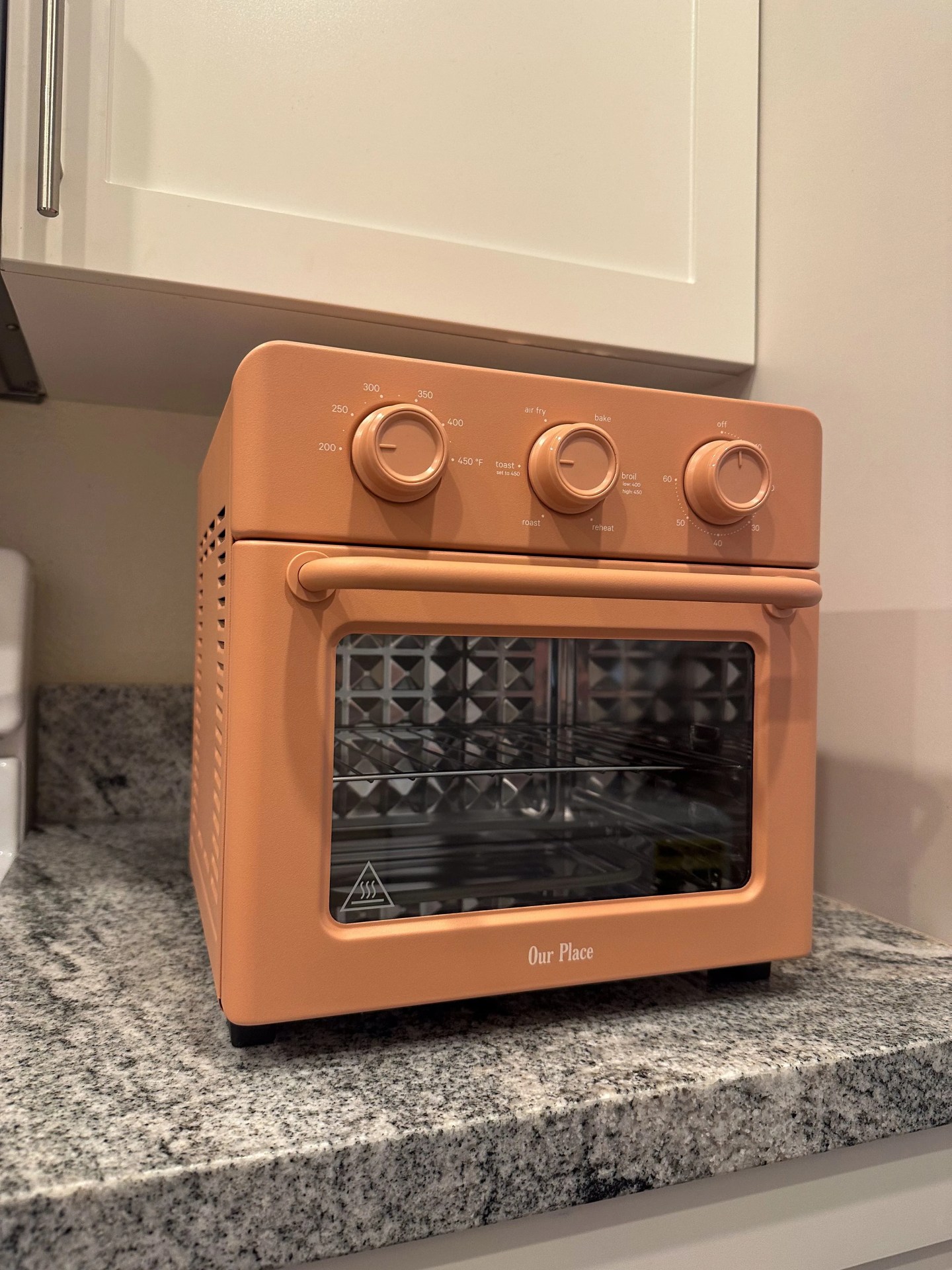 our place oven on a counter