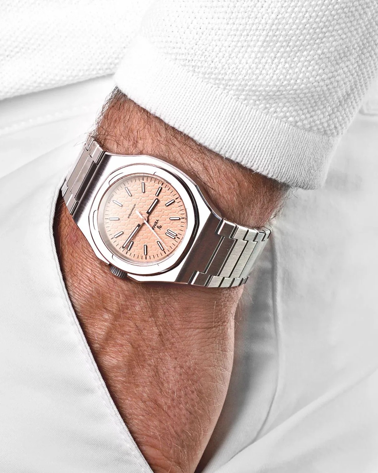 man wearing yema urban traveller watch on wrist with hand in pocket