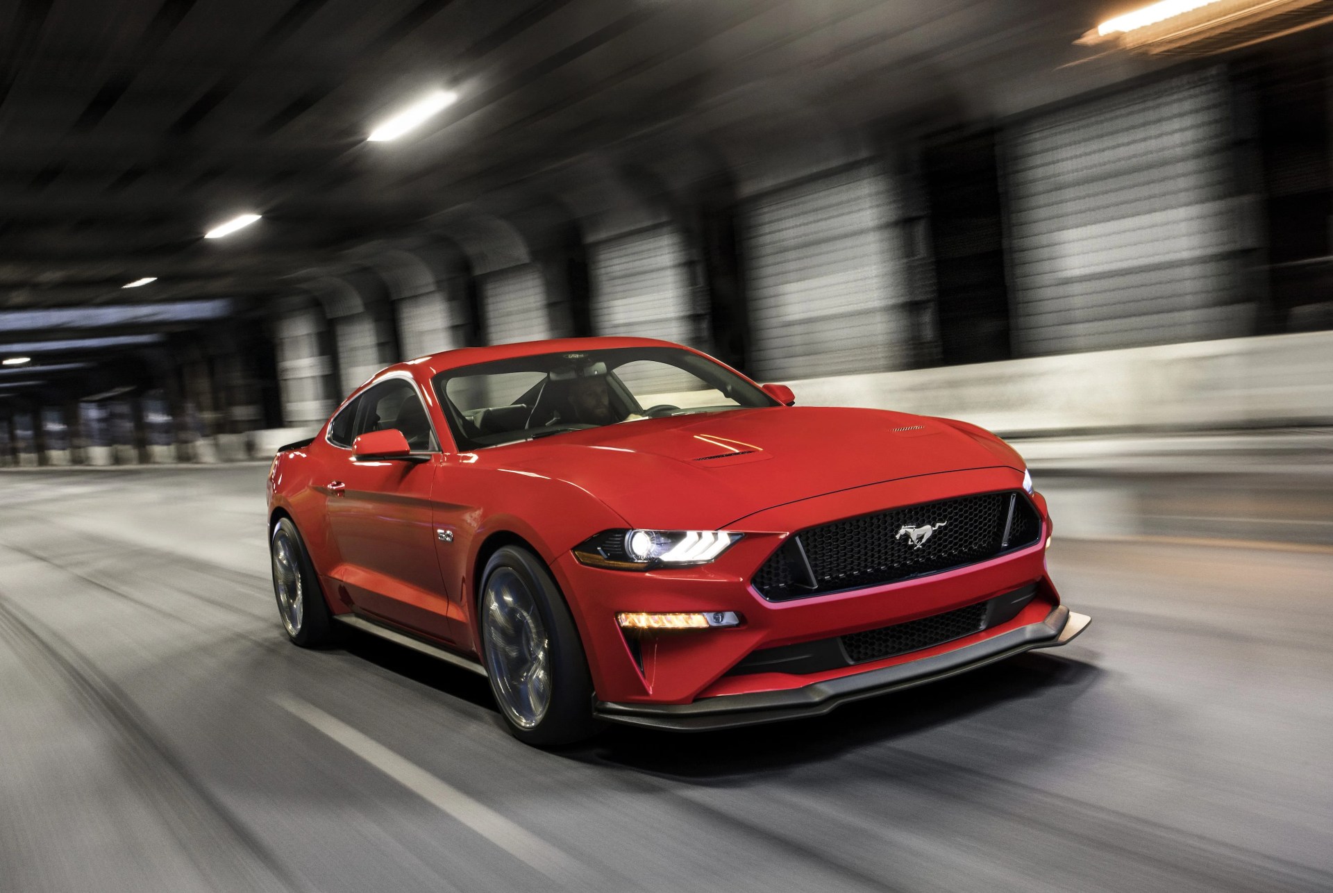 2019 ford mustang ecoboost premium fastback driving through a tunnel