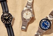three watches with white watch in the middle