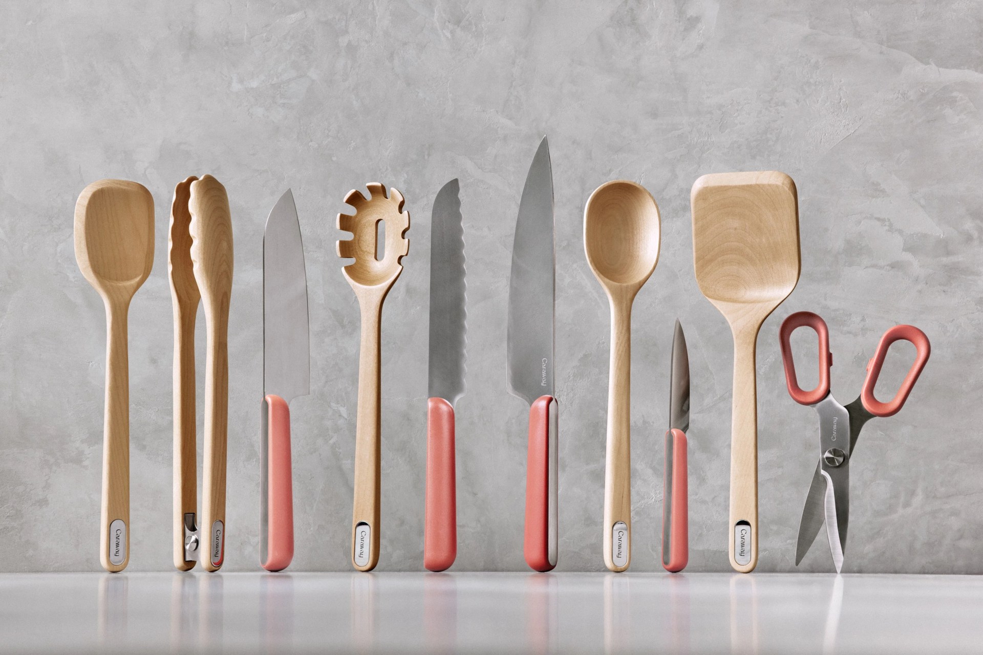 colorful knives and wooden kitchen utensils