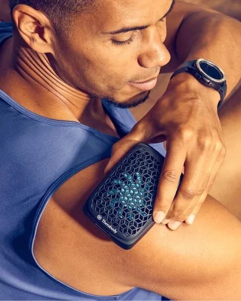 man using therabody recoverytherm cube