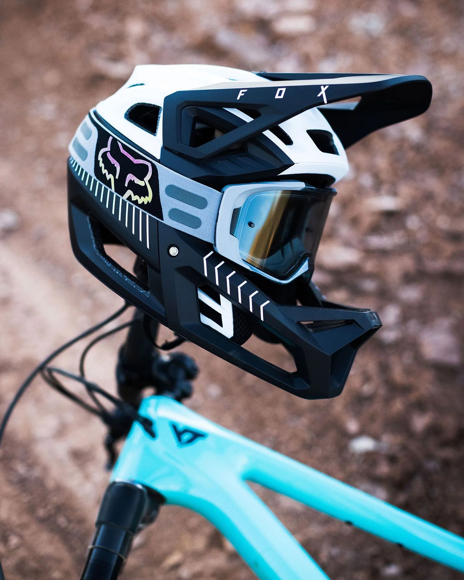 fox racing helmet resting on bike