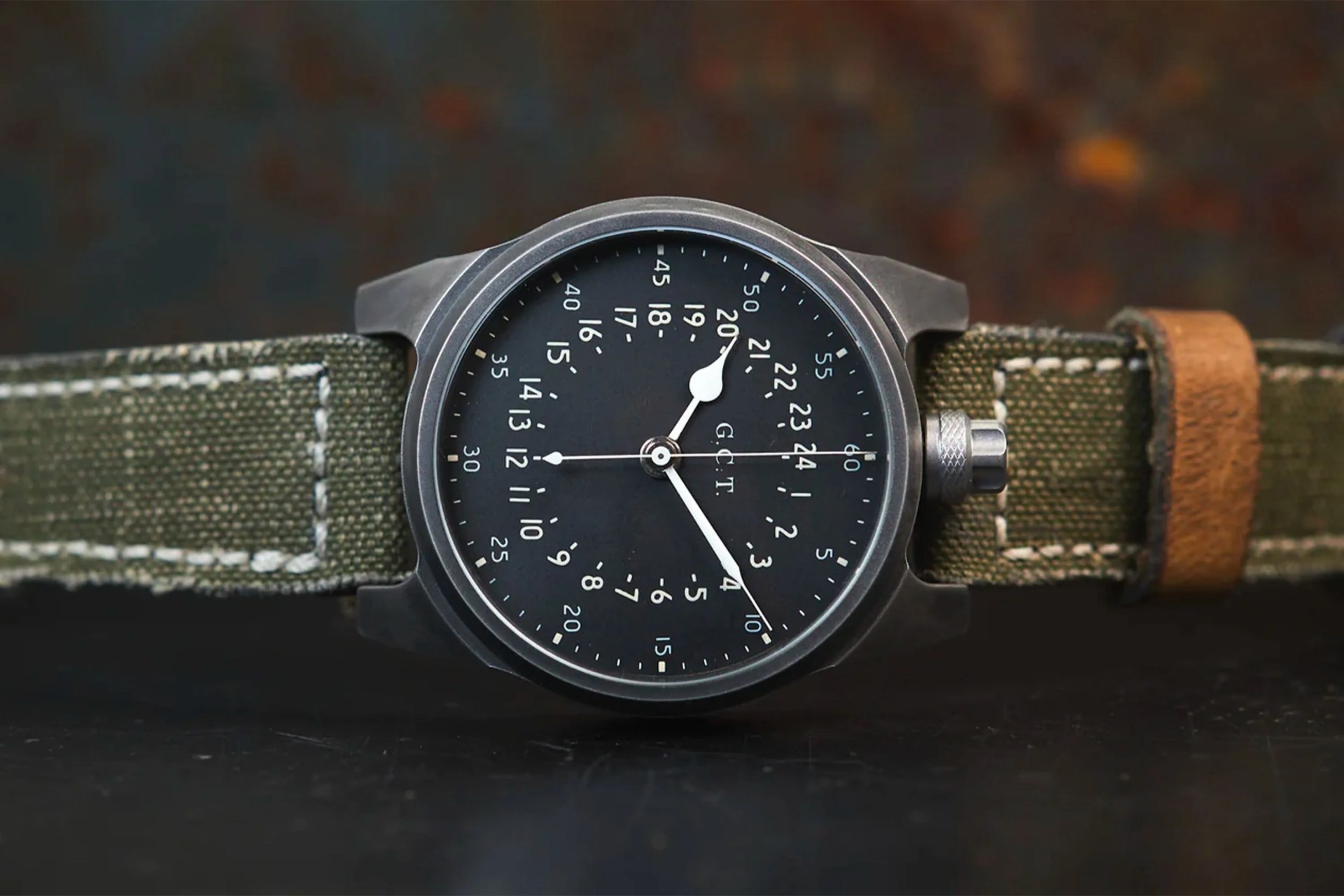 military style watch on a table