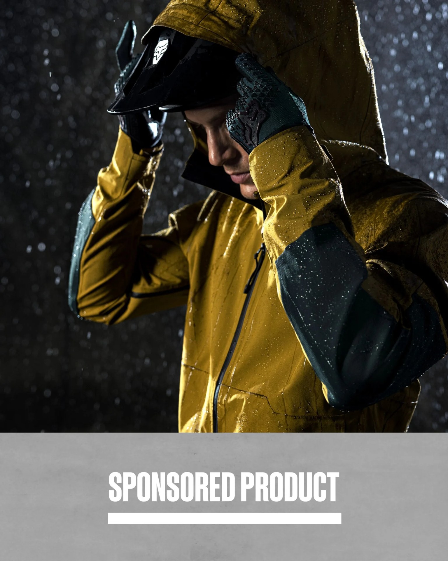 sponsored product man wearing fox racing&rsquo;s defend 3 layer water jacket in the rain