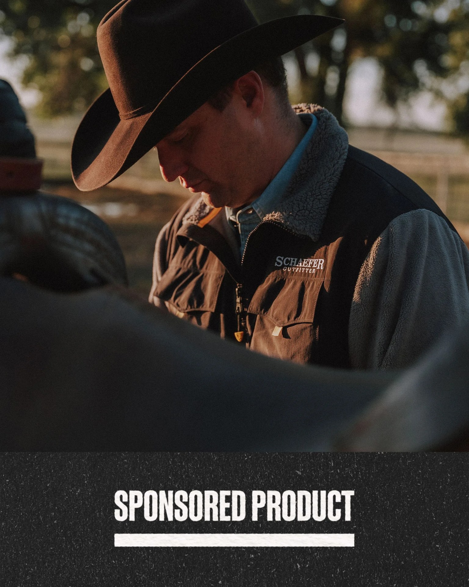 sponsored product man wearing schaefer outfitter sweater