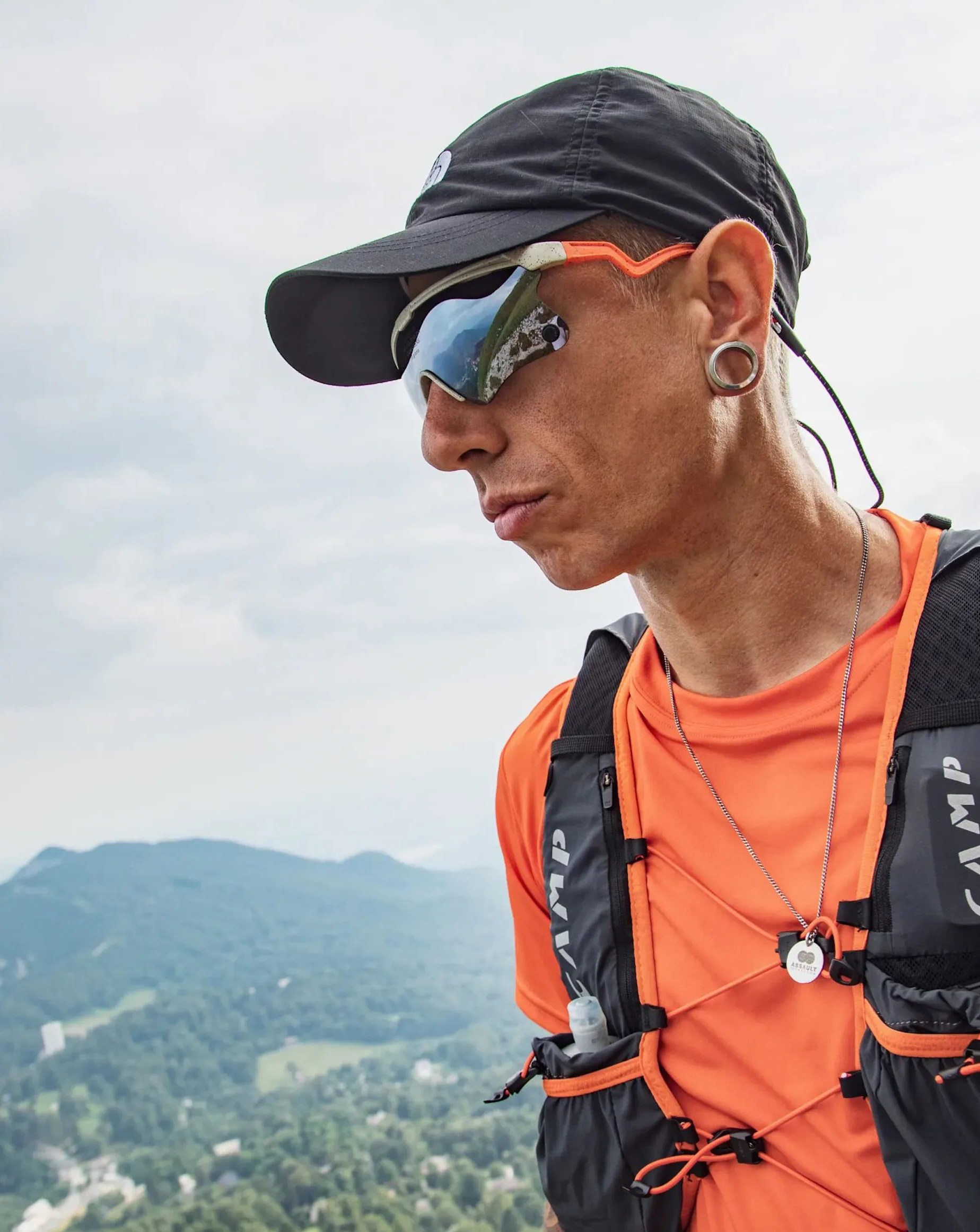 man wearing alba optics delta ultra org vzum alu sunglasses while hiking