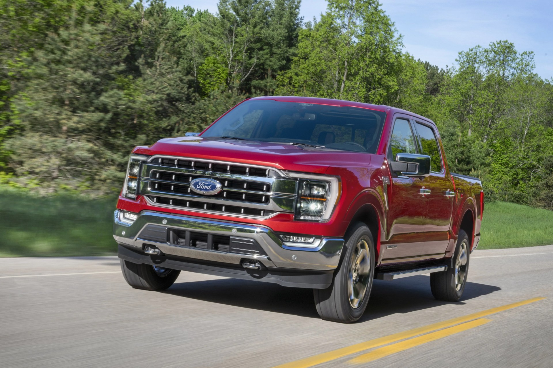 all new f 150 lariat in rapid red metallic tinted clearcoat