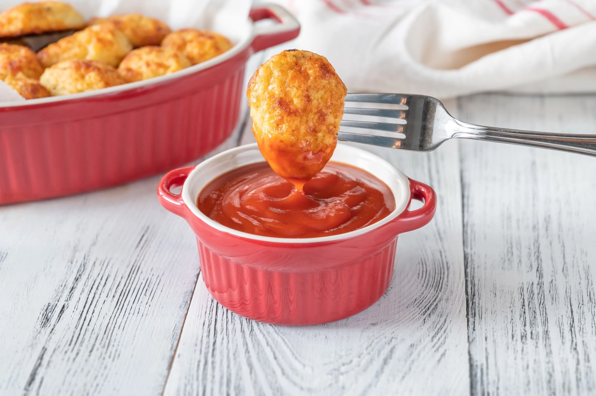 baked cheesy cauliflower tots with spicy tomato sauce,romania