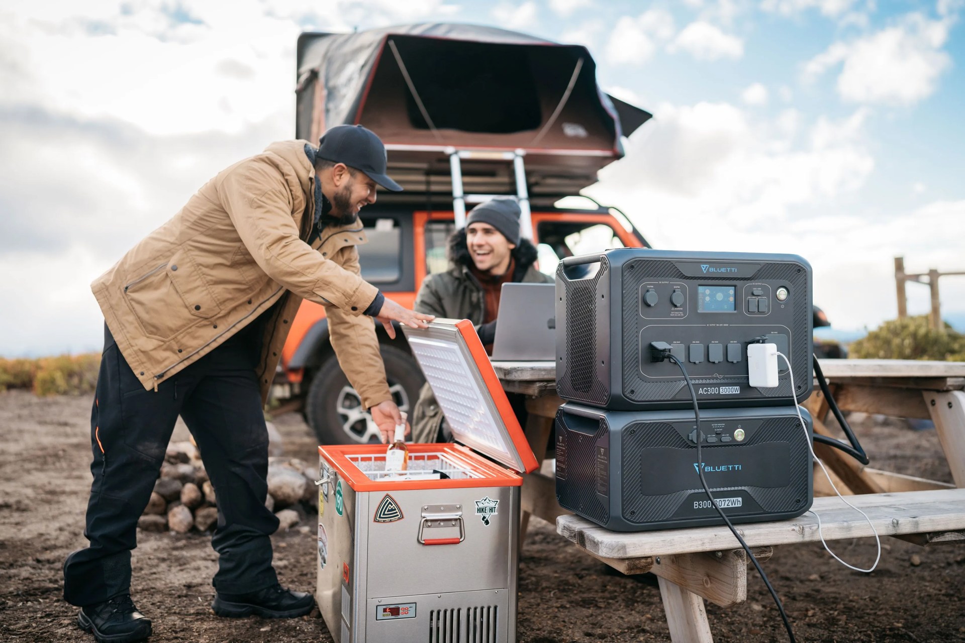 two men car camping with bluetti battery