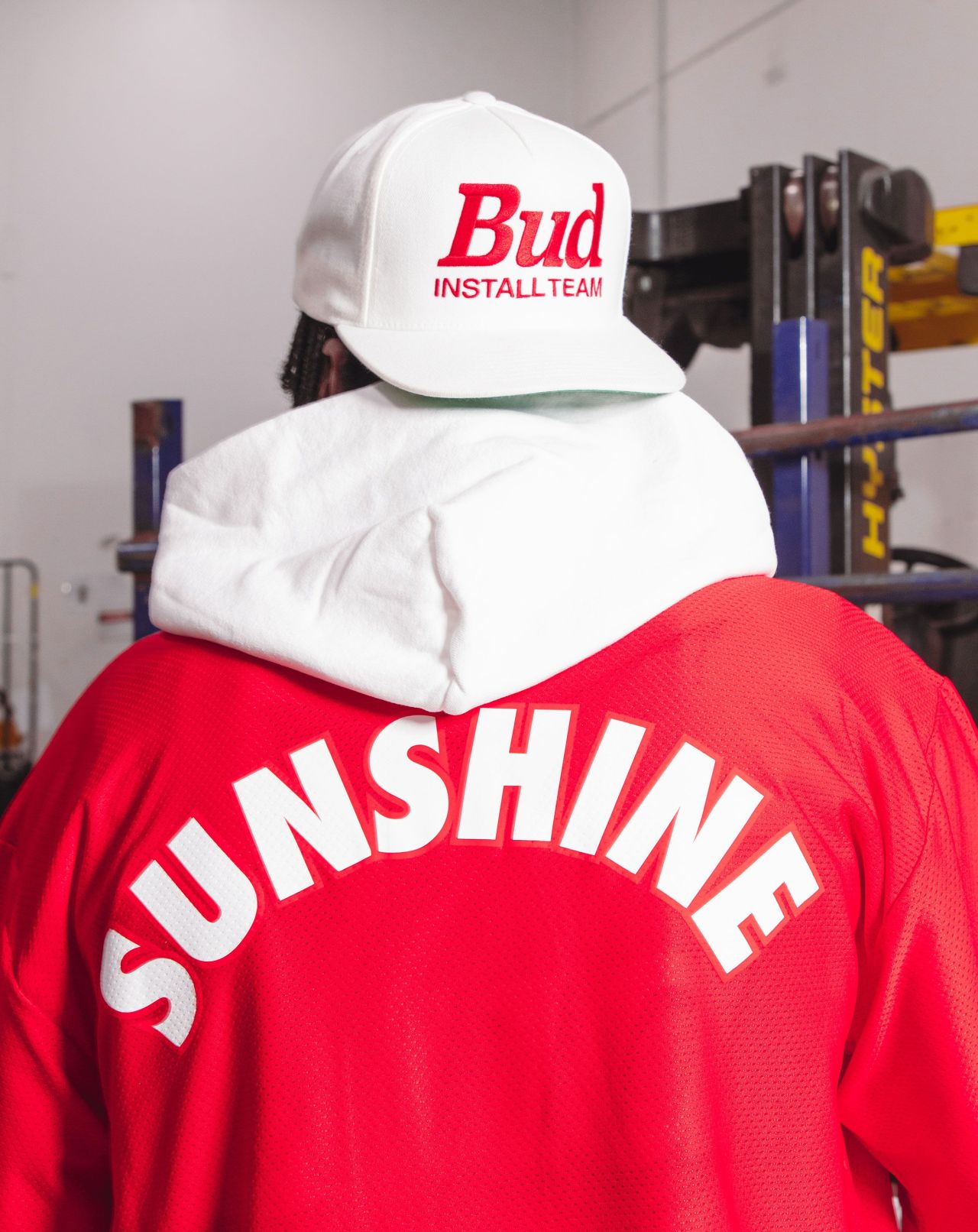 man wearing budweiser x new york sunshine collection