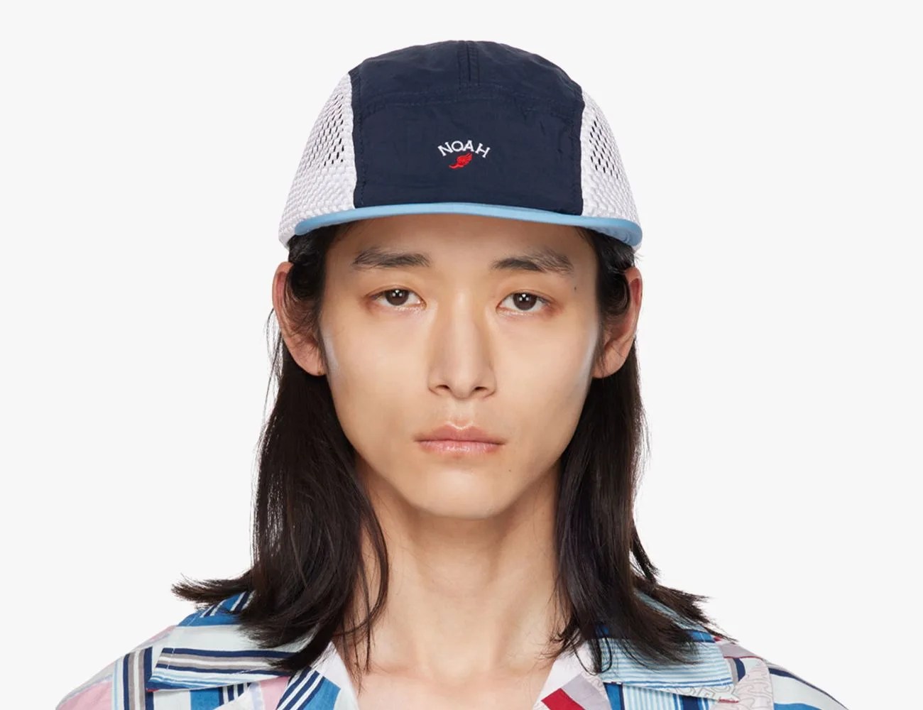 a man wearing a ball cap