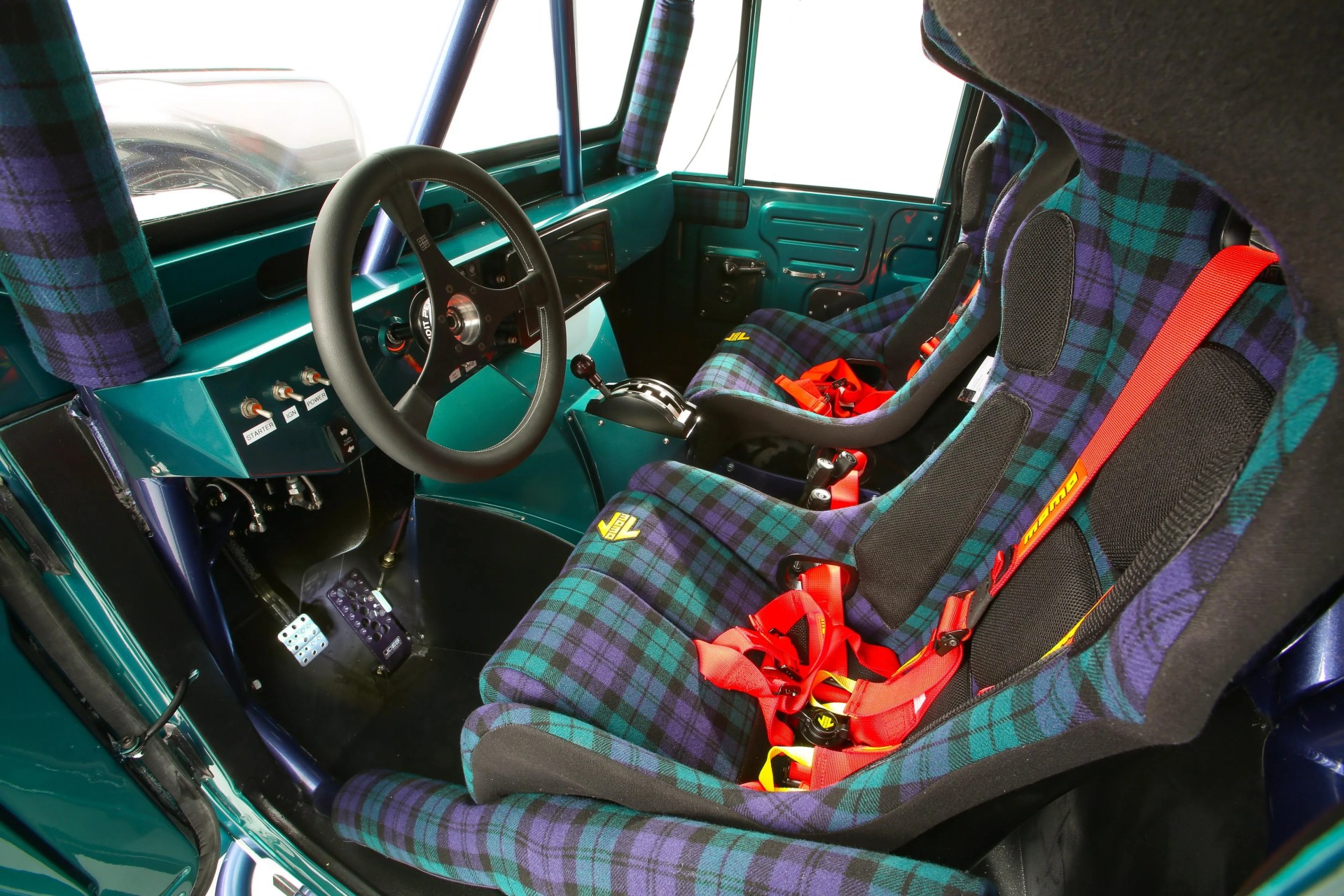 a toyota land cruiser concept with plaid seats
