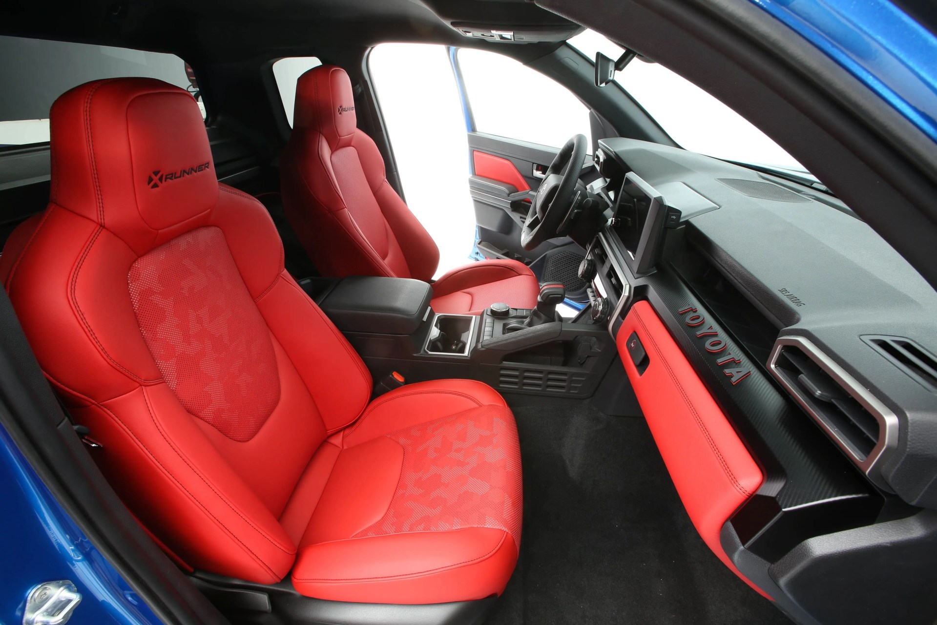 the interior of a tacoma concept with red seats