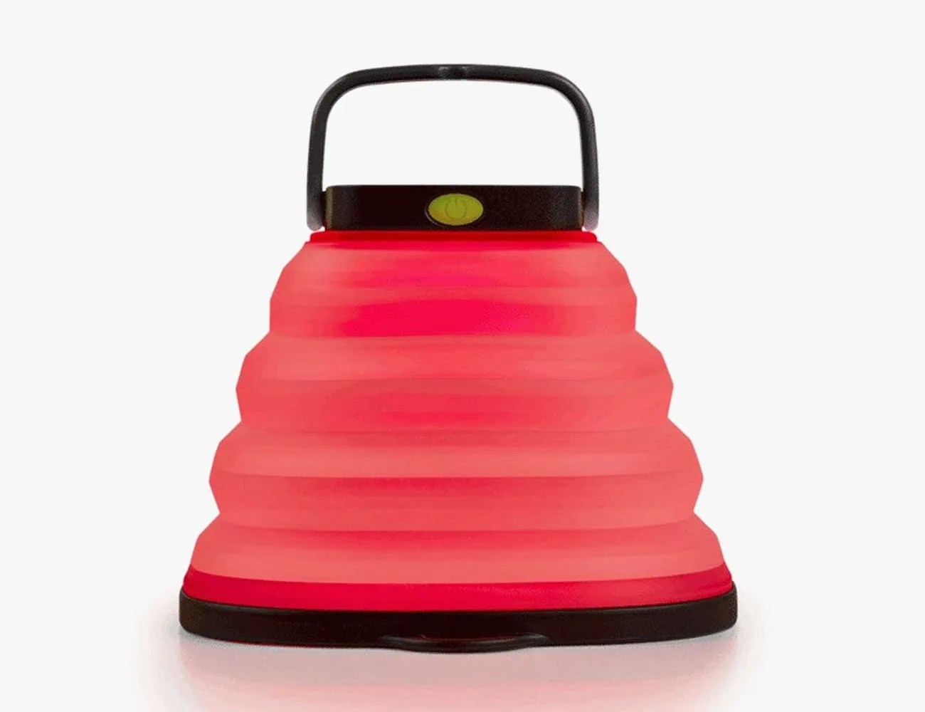 a red camp lamp
