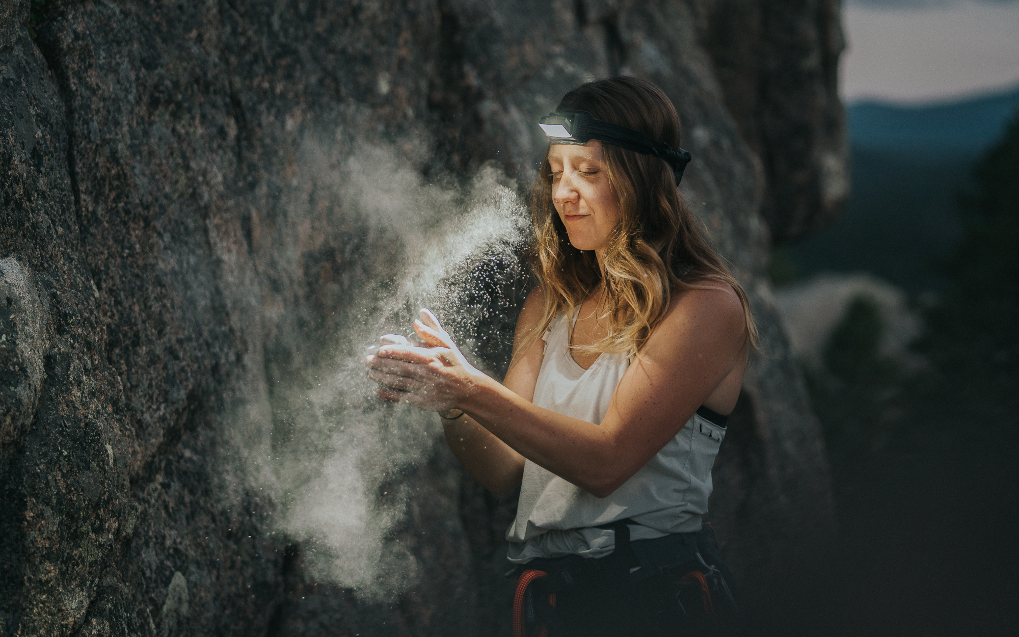 a woman holding a rock