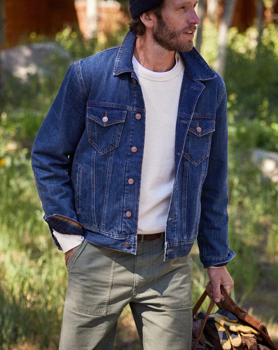 a man wearing a outerknown the blanket trucker jacket