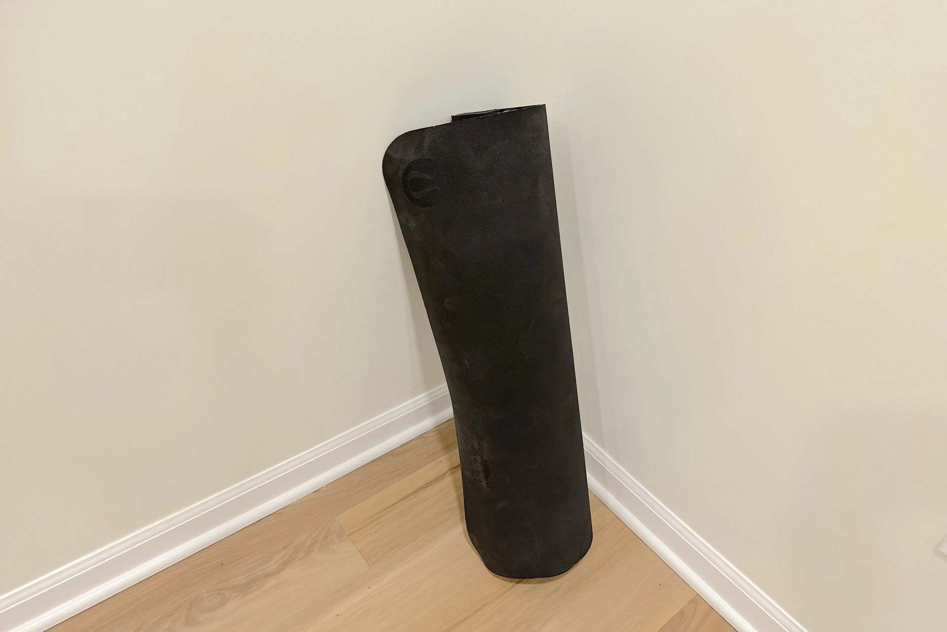 a black object on a wood surface