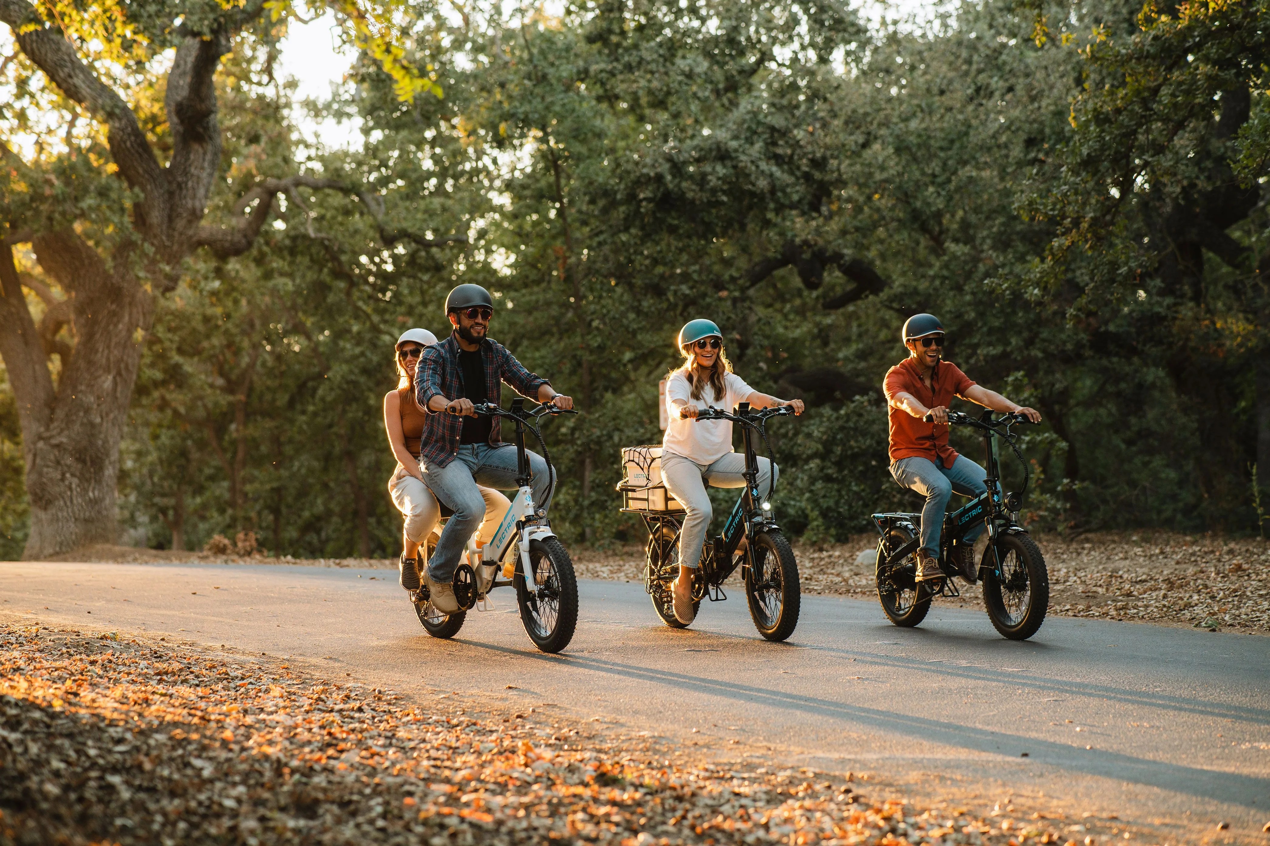 a group of people riding ebikes