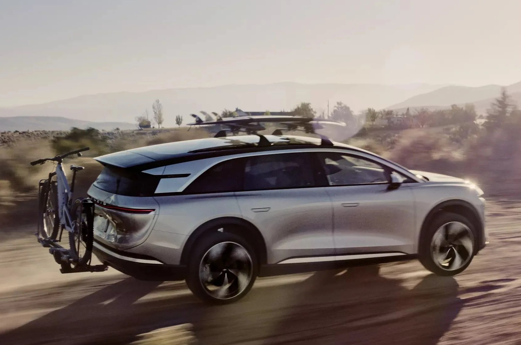 a car with a bike on the hood