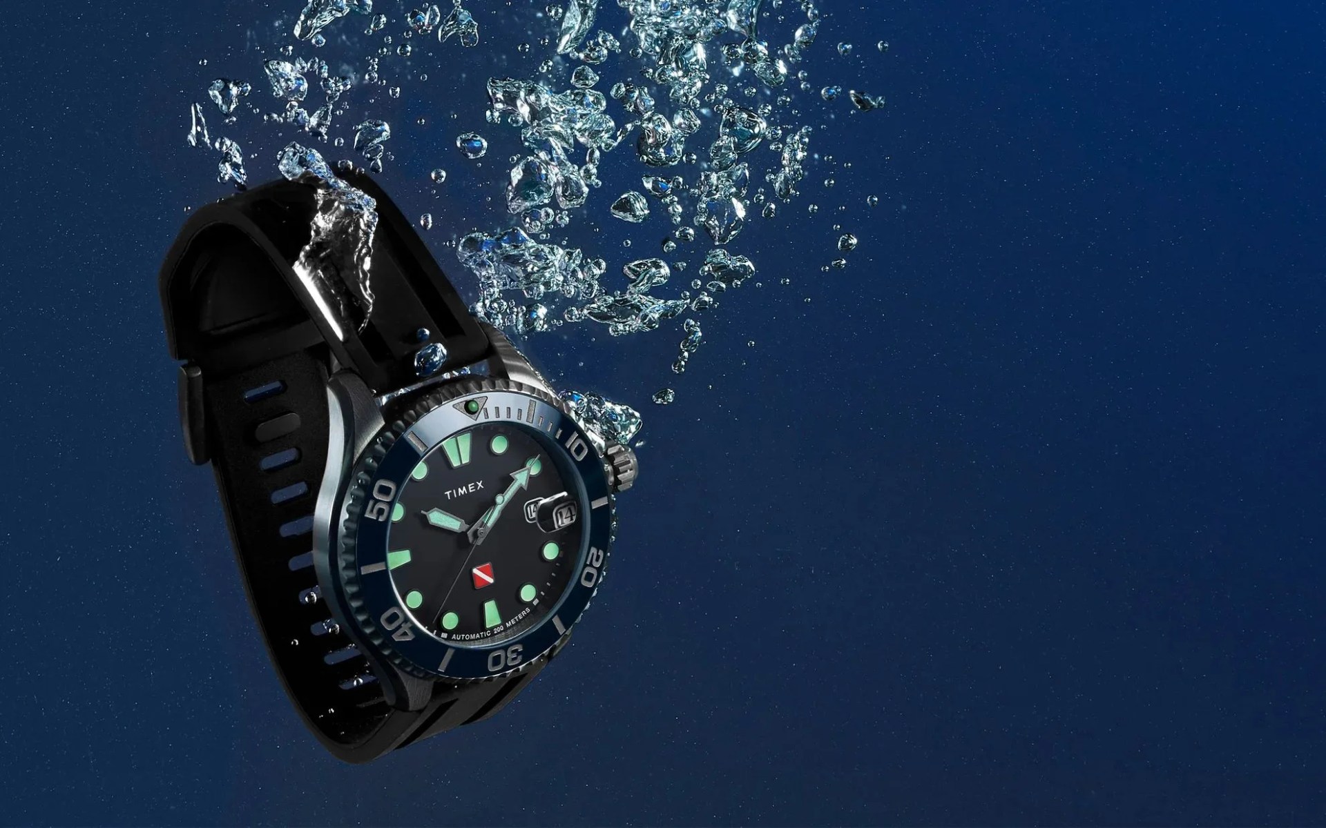 a timex tiburon automatic 44mm synthetic rubber strap watch in the water