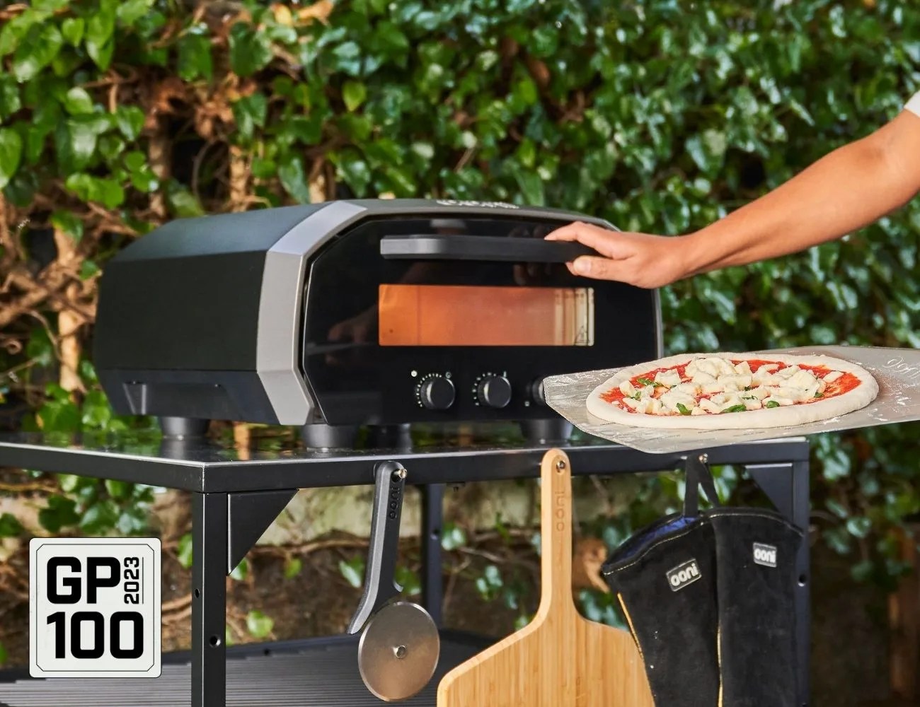 a person is preparing a pizza