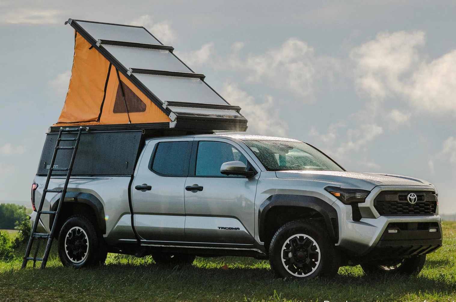 a truck with a camper on top