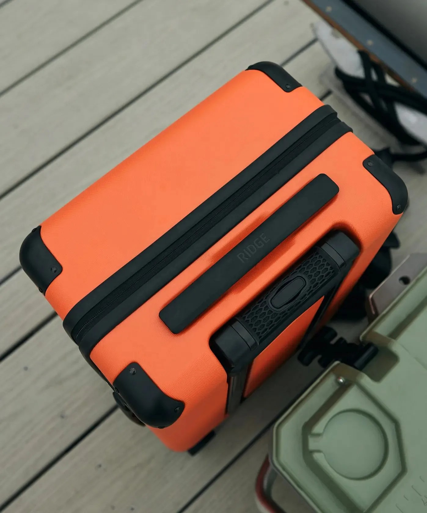 a orange ridge carry on suitcase