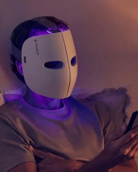 a person wearing a theraface mask