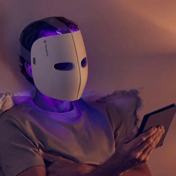 a person wearing a theraface mask