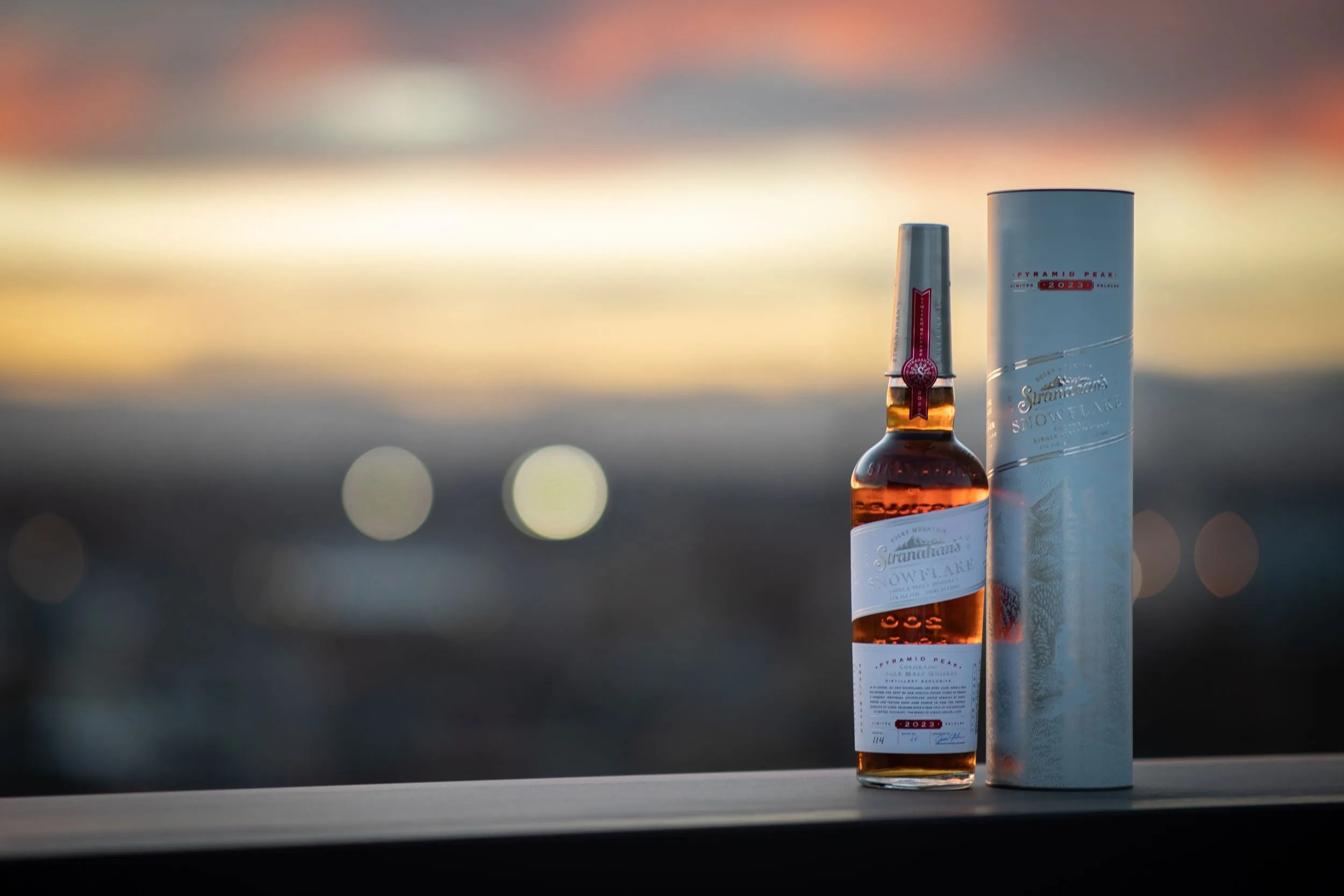 a bottle of alcohol and a box