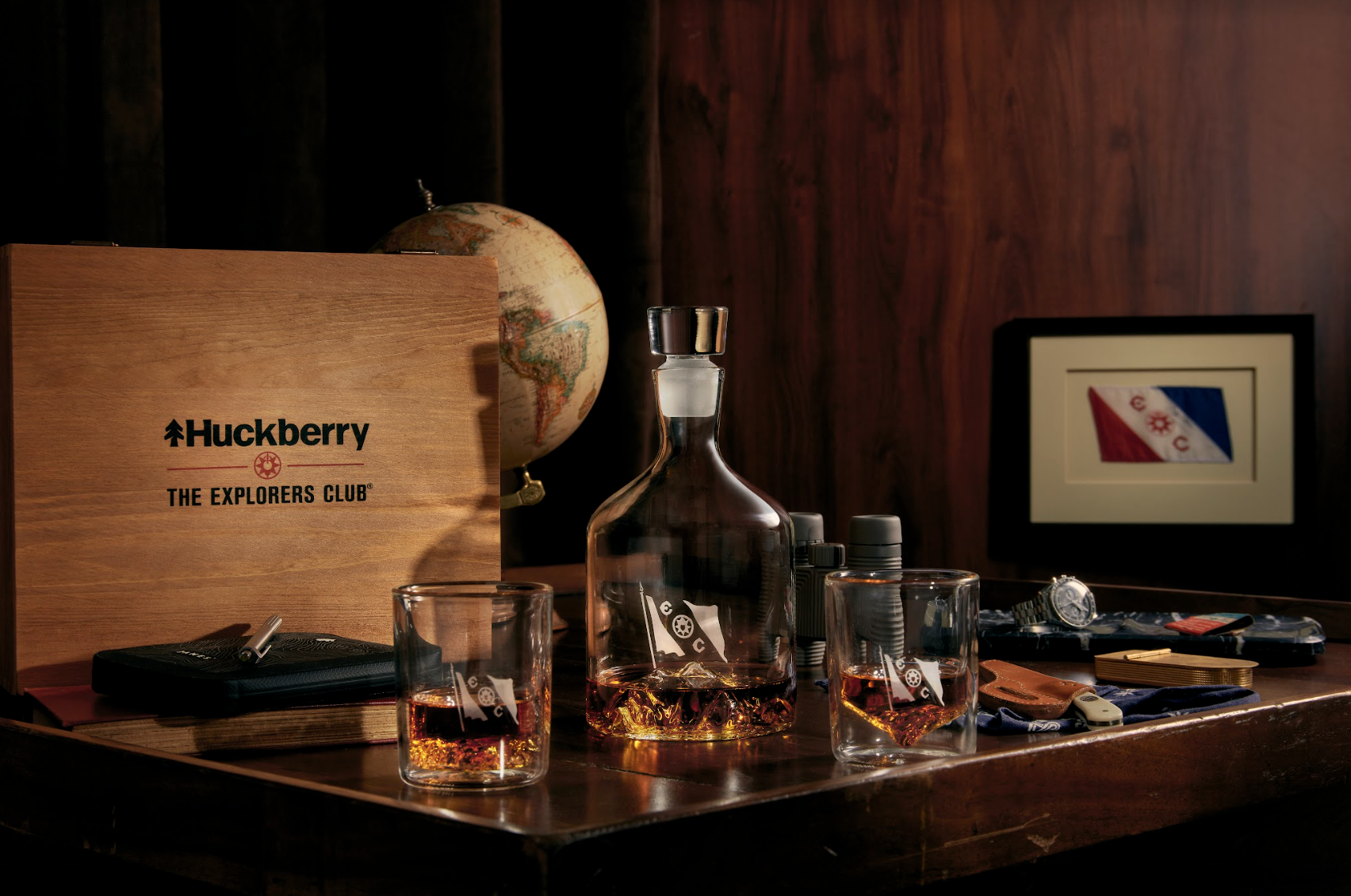 a table with a box and a bottle of alcohol on it
