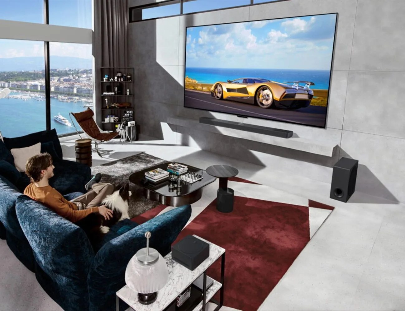 a man and a woman sitting on a couch watching a tv