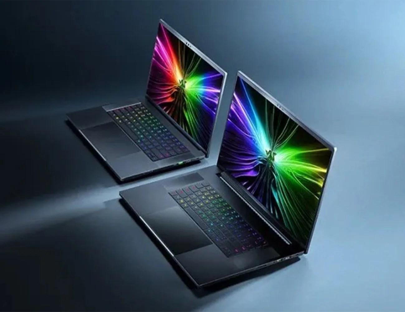 a laptop with a colorful light