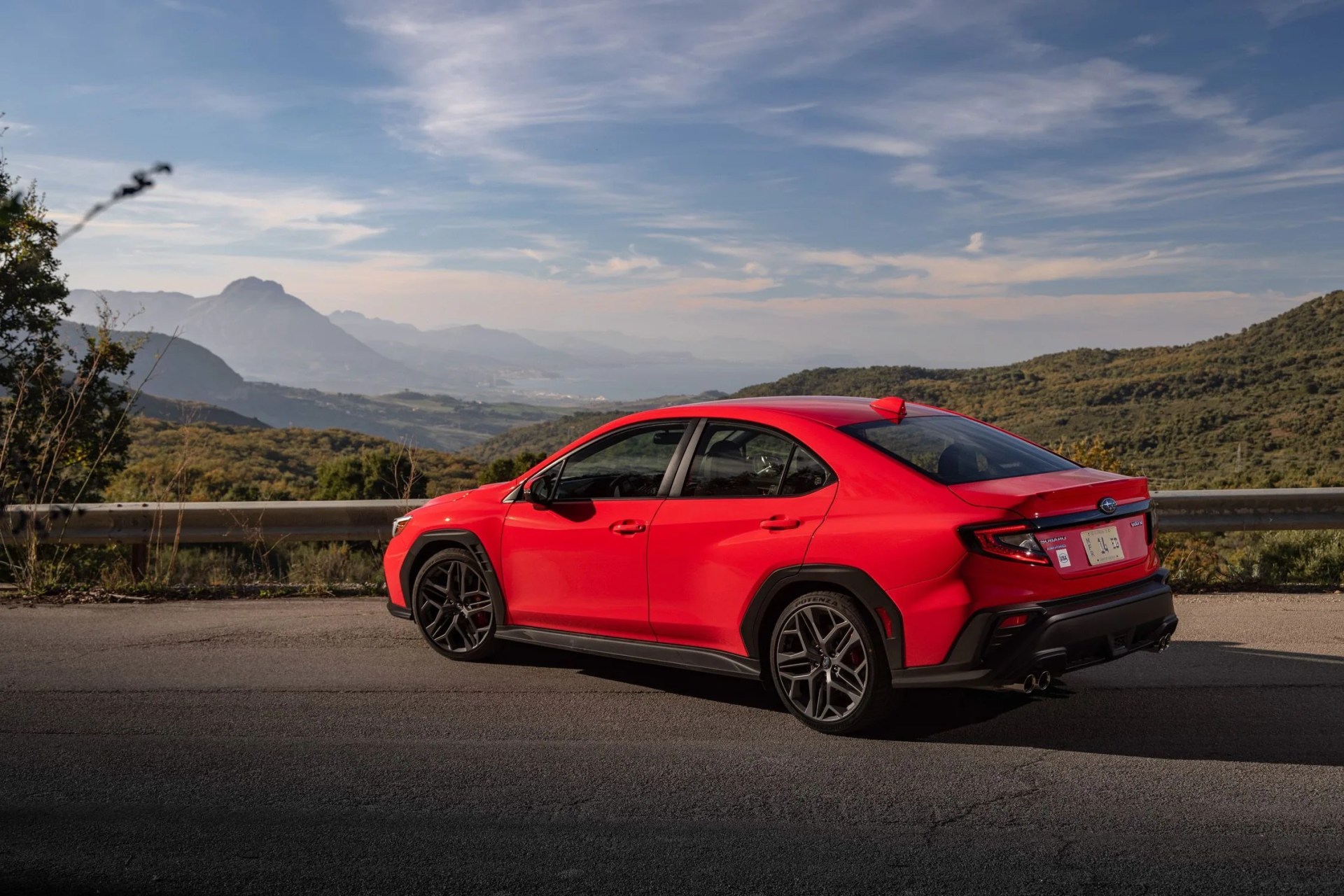 a red car on a road