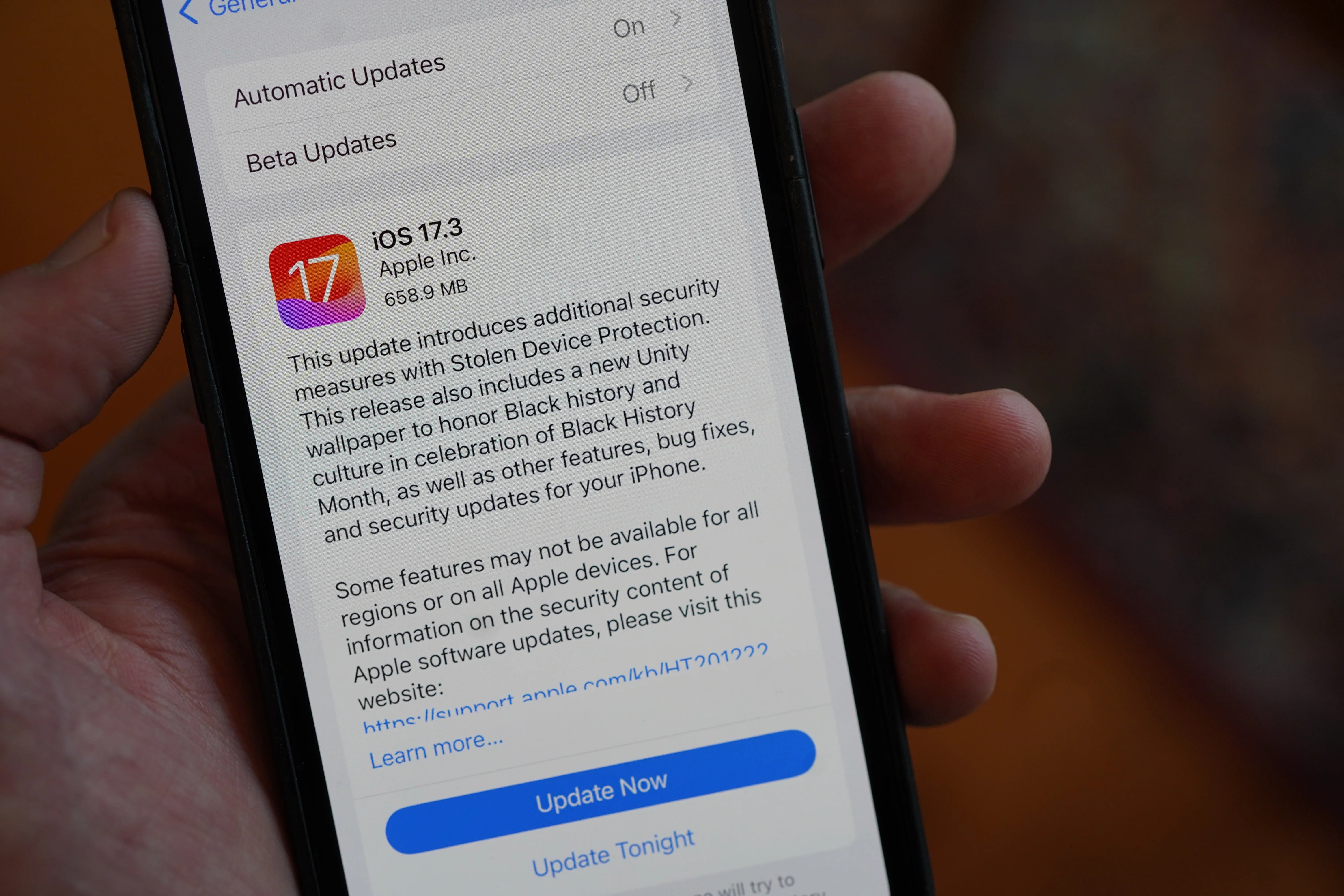 a person holding an iphone