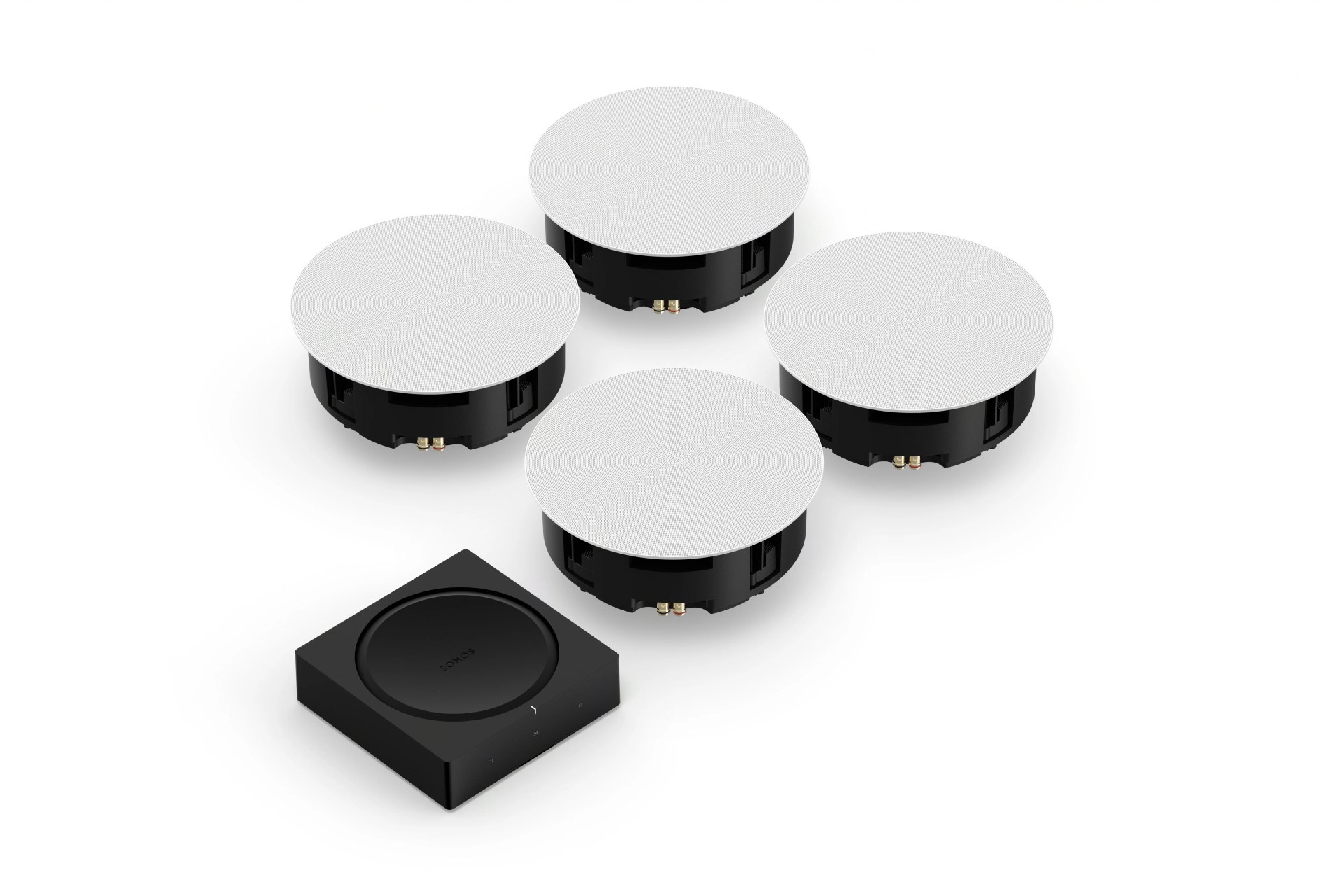 a set of four ceiling speakers