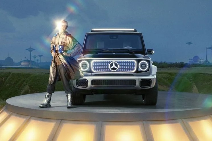 mercedes benz eqg concept on a stand with a golden god