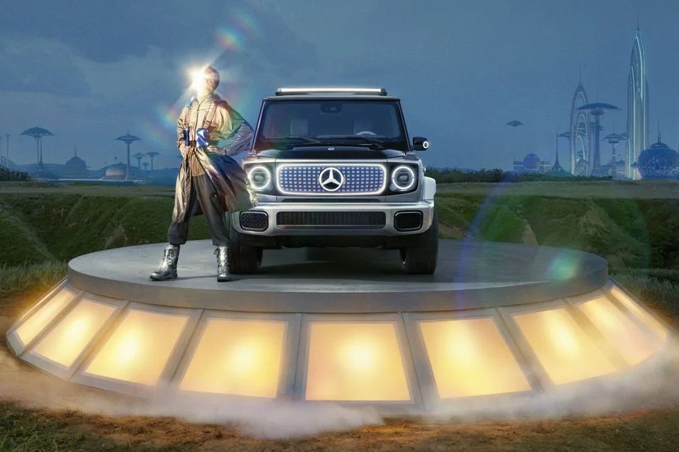 mercedes benz eqg concept on a stand with a golden god
