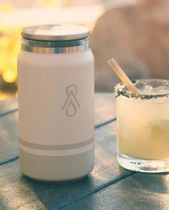 smmt serpa tumbler in aspen white next to a drink