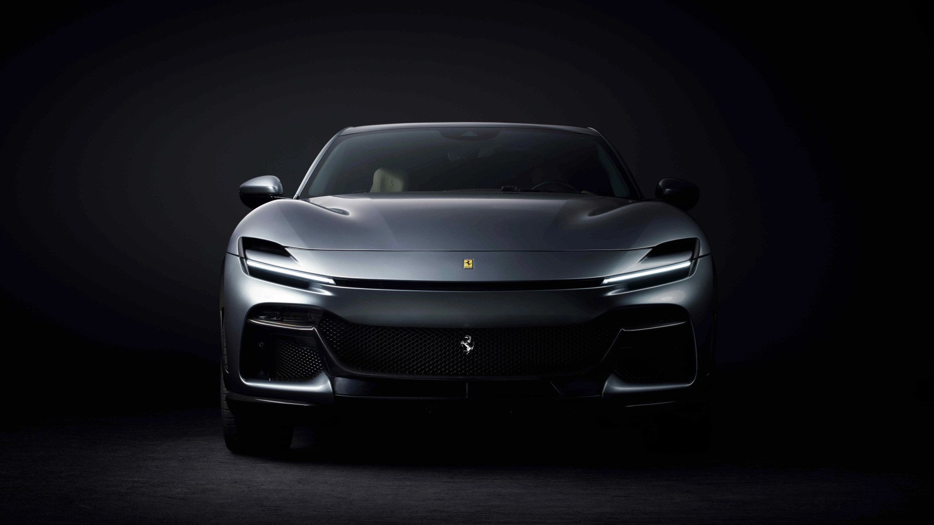 Ferrari Purosangue front against black background