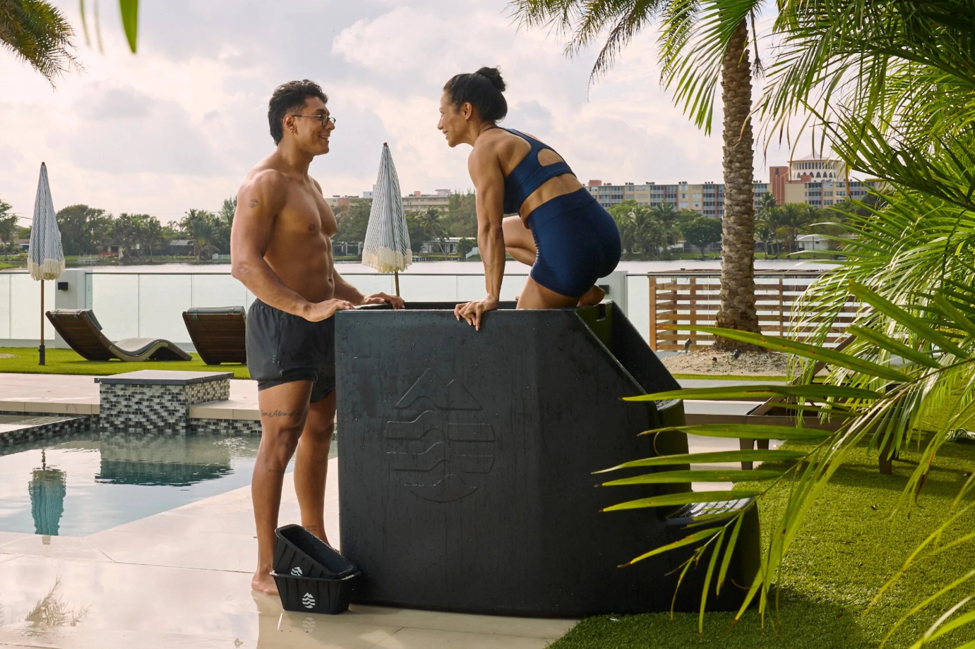 man talking to woman getting into Ice Barrel 500