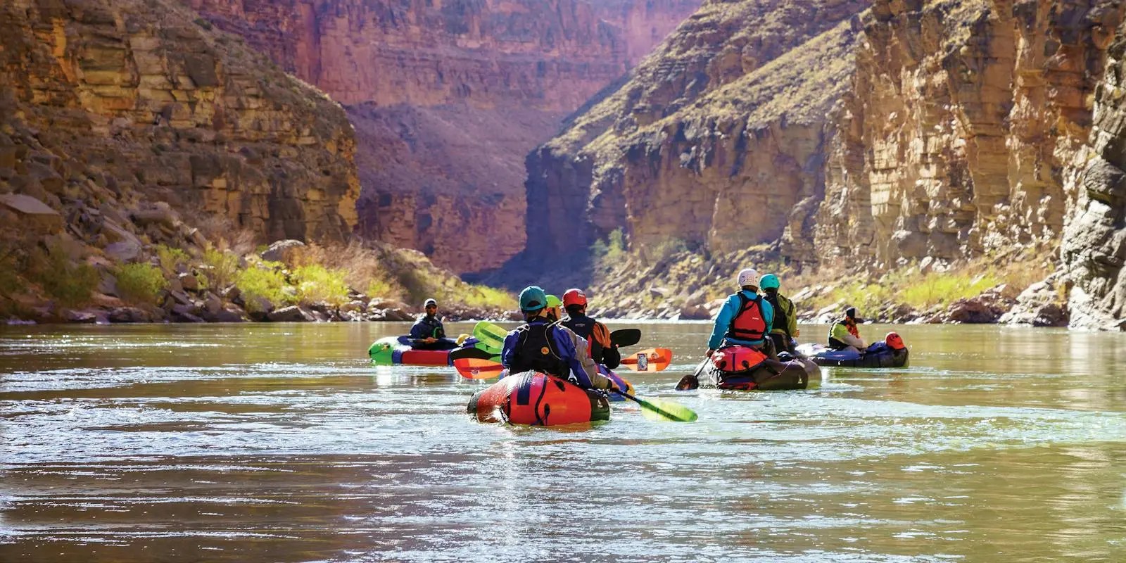 people floating down a river in a Alpacka Raft