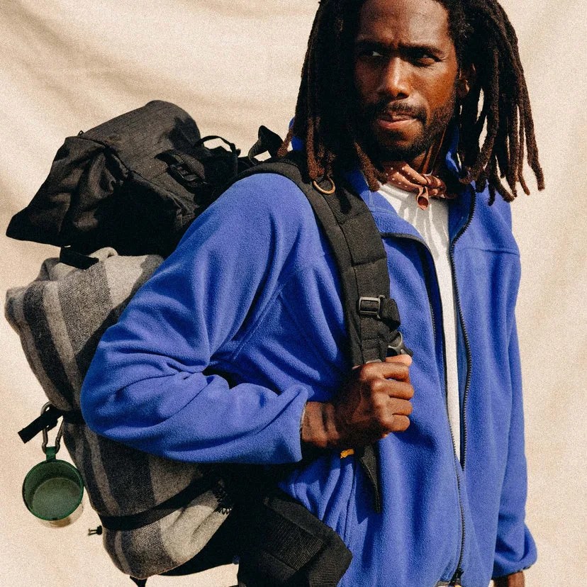 Man wearing Taylor Stitch The Trail Fleece in Alpine Dusk