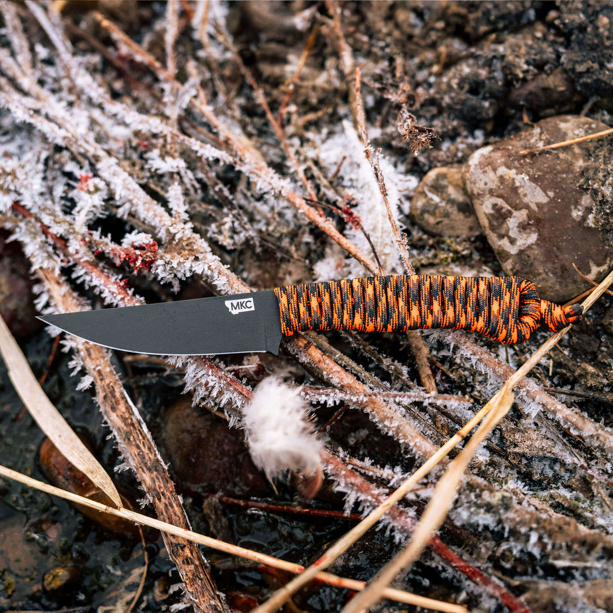 montana knife company speedgoat 2 on a pile of sticks